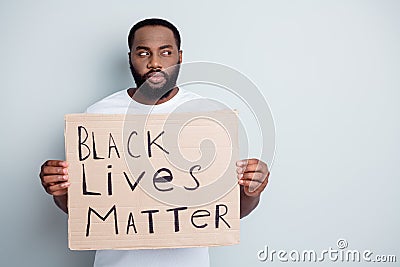 Photo of serious disappointed dark skin african protester placard community against black citizens civil lawlessness Editorial Stock Photo