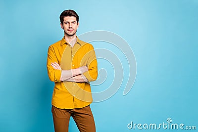 Photo of serious strict freelancer with hands folded contemplating his workers in company near empty space isolated over Stock Photo