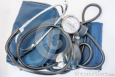 Photo set of stethoscope and arm sphygmomanometer with carrying bag or case. On white background is black stethoscope with sphygmo Stock Photo