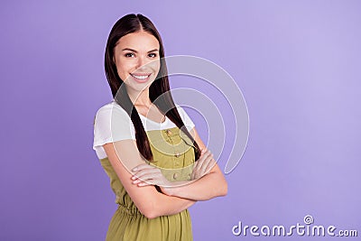 Photo of shiny charming young lady wear white t-shirt smiling hands folded empty space purple color background Stock Photo