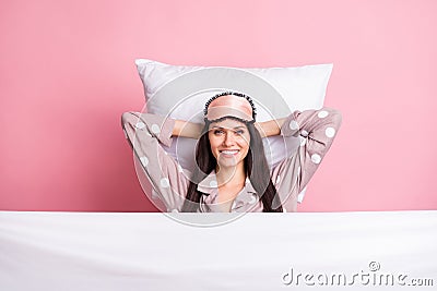 Photo of shiny relaxing young lady nightwear mask covering blanket lying pillow arms behind head isolated pink color Stock Photo