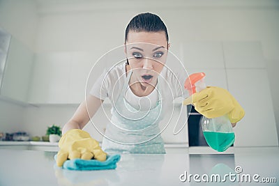 Photo of shocked stunned woman noticed something terrible on table while cleaning room Stock Photo