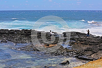 Photo shoot Hawaii rocks waves Editorial Stock Photo