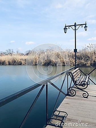 lake, water, reeds, pier, bench, lamppost, wooden pier Stock Photo
