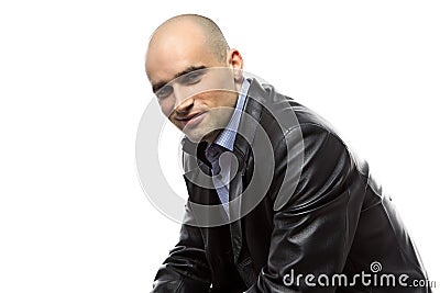 Photo sitting hairless man in leather jacket Stock Photo