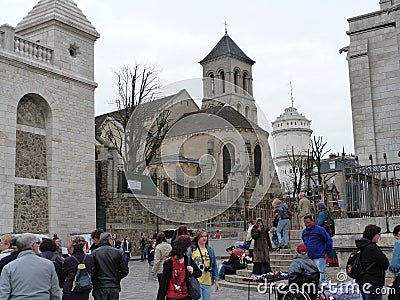 Photo sketches at Montmartre in Paris: tourists, artists, sights. Editorial Stock Photo