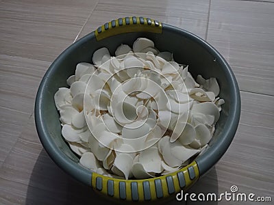 The photo of the sliced cassava is put in a bowl Stock Photo
