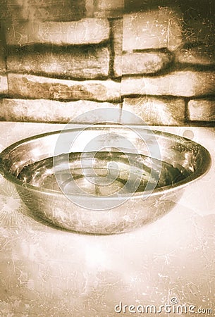 photo of a small bowl of clear water Stock Photo
