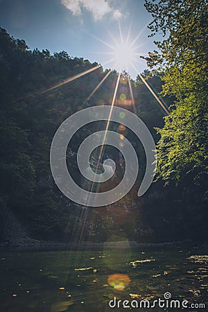 Panorama of Divje jezero with sun Stock Photo