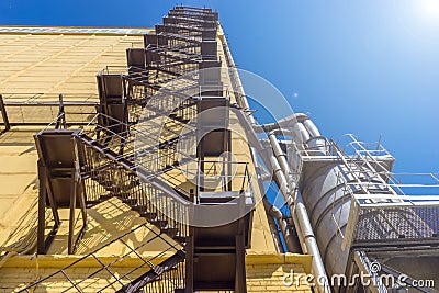 Stairway to Heaven. Modern construction metal scaffolding on the wall Stock Photo