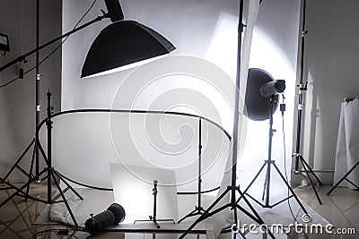 Photo studio with lights and white background Stock Photo