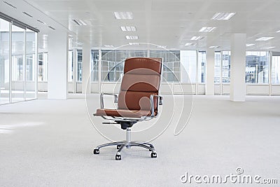 Swivel chair in empty office space Stock Photo