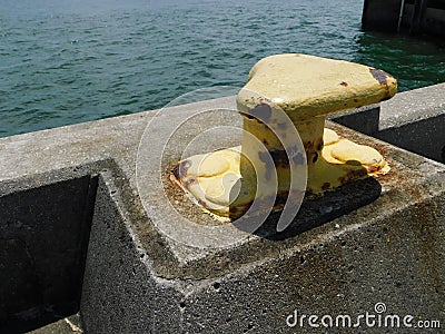 A cleat at the docks for ships to anchor and re-supply Stock Photo