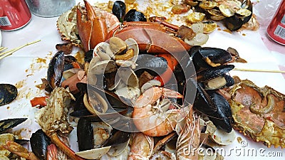 The Singapore cuisine - curry chilli crabs with mussels and clams Stock Photo