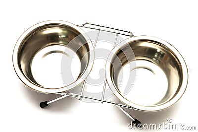 A duo double position aluminium pet food feed bowl holder white backdrop Stock Photo