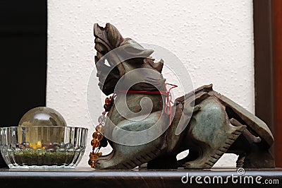 A jade Qilin auspicious oriental beast Fengshui display Stock Photo