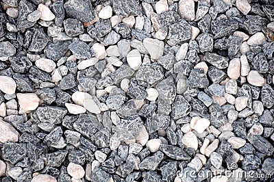 Many several small rocks stones laid out on the ground Stock Photo