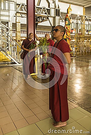 Monks in Reclining buddha , rangoon,myanmar Editorial Stock Photo