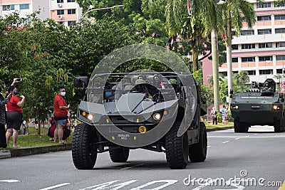 A Singapore military light strike vehicle driving past the heartlands at Jurong West Avenue 5 during the nation`s 55th National Da Editorial Stock Photo