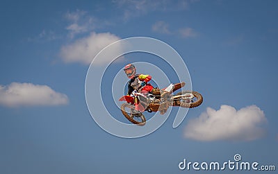 Motocross Action Scene - Rider in the clouds Editorial Stock Photo