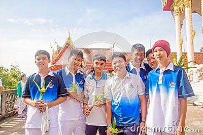 Thai students wear white clothes making a merit at the temple in Pranburi, Thailand July 21,2017 Editorial Stock Photo