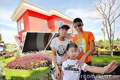 Three asian kids at the strange house musuem in Pattaya Rayong, Editorial Stock Photo