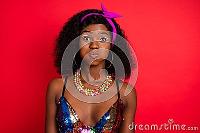 Photo of tricky childish wavy dark skin lady wear pin up outfit bloated cheeks red color background Stock Photo