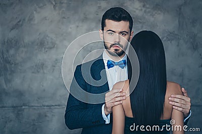 Photo of two chic people stylish couple guy hiding face of his lady standing close tenderness holding her naked Stock Photo