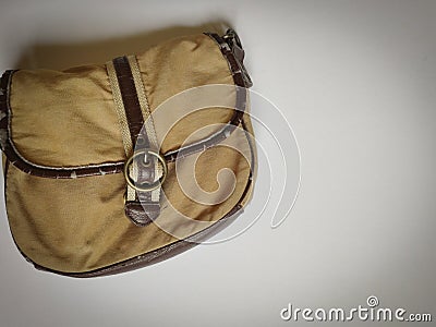 photo of used small sling bag in vintage background Stock Photo