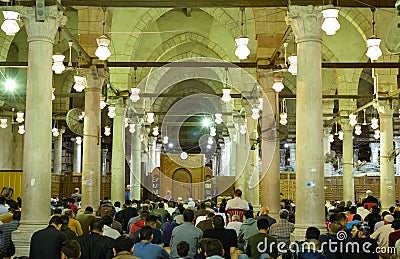 Photo of a view of a crowd of Muslims performing Ramadan tarawih prayers at the amr bin ash mosque at night Editorial Stock Photo