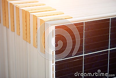Photo voltaic panels set ready for transportation and installation. Renewable energy production. Stock Photo