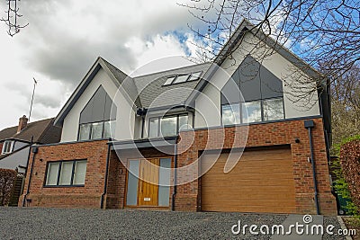 Large detached house with integrated garage in Chorleywood Stock Photo