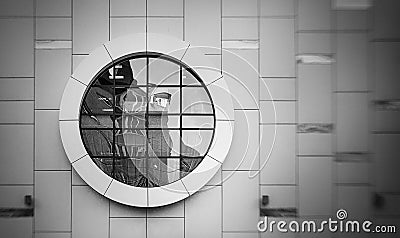 Photo of white modern building with round window, black and white Stock Photo