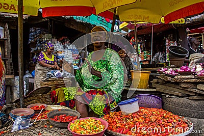 Market activity in a popular african market Editorial Stock Photo