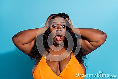 Photo of worried confident figure lady hear tourist border closed hands head scream wear bikini on blue color Stock Photo