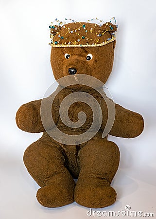 Photo of a 45-year-old bear with a homemade pearl crown on his head,handmade Stock Photo