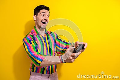 Photo young addicted gamer advertising new cyber club playing videogames using black wireless joystick isolated on Stock Photo