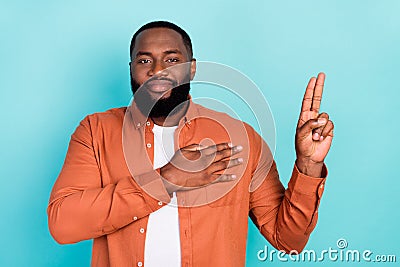 Photo of young african man happy positive smile hand on chest oath promise isolated over turquoise color background Stock Photo