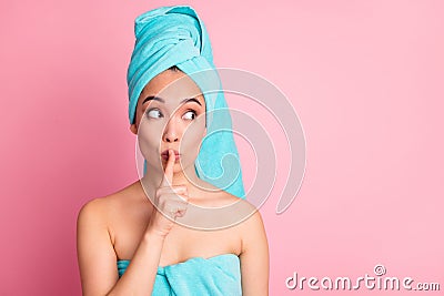 Photo of young asian girl look empty space show silence sign keep secret no talk isolated over pink color background Stock Photo