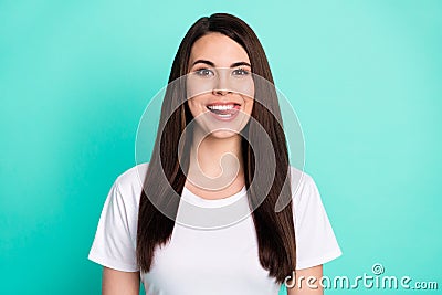 Photo of young attractive woman happy positive smile tongue lick teeth tasty hungry food isolated over teal color Stock Photo