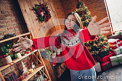 Photo of young brown hair positive pretty woman wear red ornament ugly sweater hands want hug you fir tree behind Stock Photo