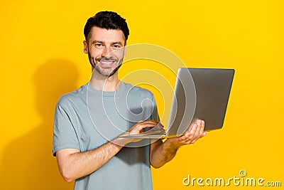 Photo of young confident professional coder programmer hold new laptop checking his email business positive smiling Stock Photo