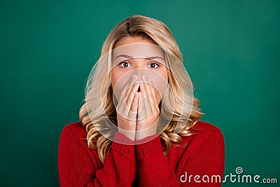 Photo of young girl close lips amazed shocked surprised afraid scared over green color background Stock Photo