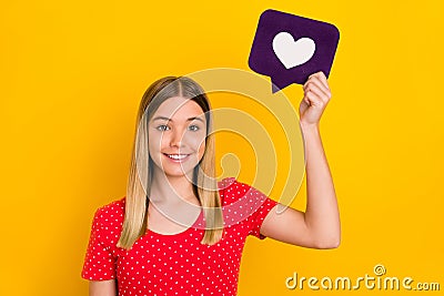 Photo of young girl share paper card share comment repost app button isolated over yellow color background Stock Photo