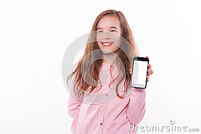 Photo of young girl showing empty phone screen Stock Photo