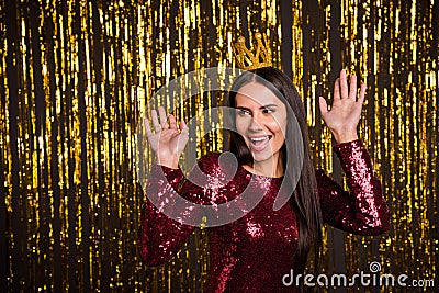 Photo of young happy excited smiling beautiful girl with crown on head celebrate prom on glittered background Stock Photo