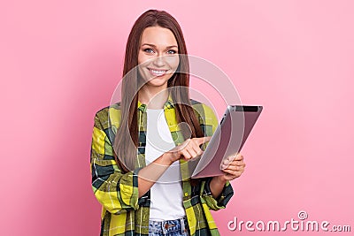 Photo of young office manager assistant girl wear yellow checkered jacket hold tablet browsing internet check tasks Stock Photo