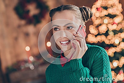 Photo of young pretty girl speak talk cellphone online wish merry christmas atmosphere magic indoors Stock Photo