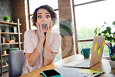 Photo of young it specialist girl hands cheeks crazy reaction received her desirable invoice payments salary isolated in Stock Photo