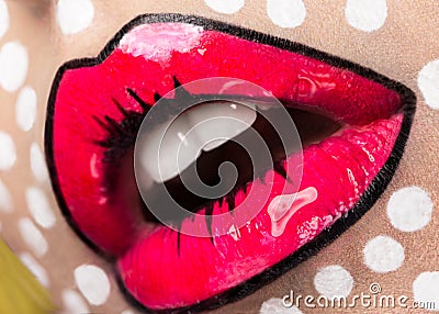 Photo of young woman with professional comic pop art make-up. Creative beauty style. Close up lips Stock Photo